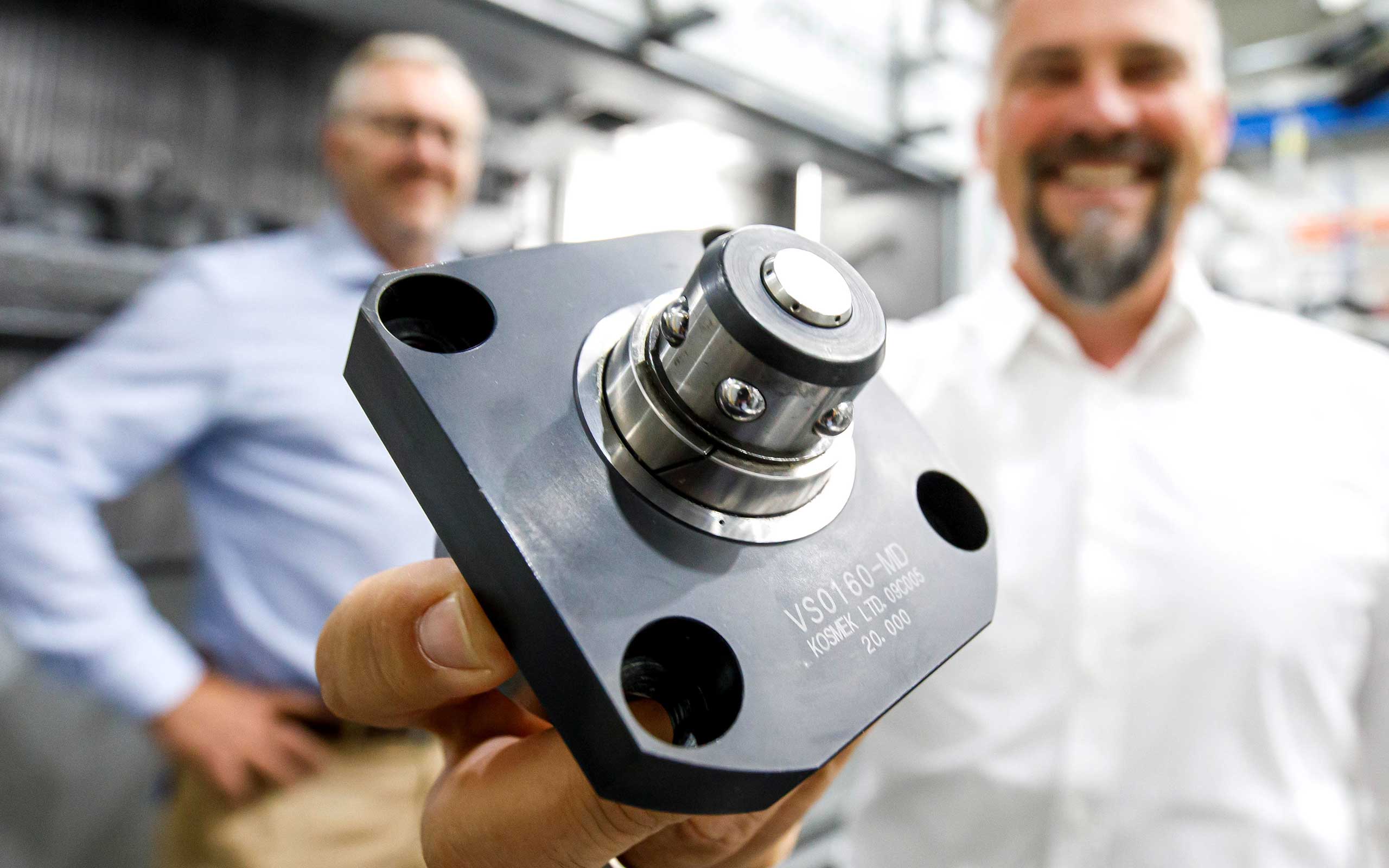 Close-up of KOSMEK VS Pallet Clamp component used at ANGER Machining for high-precision clamping.