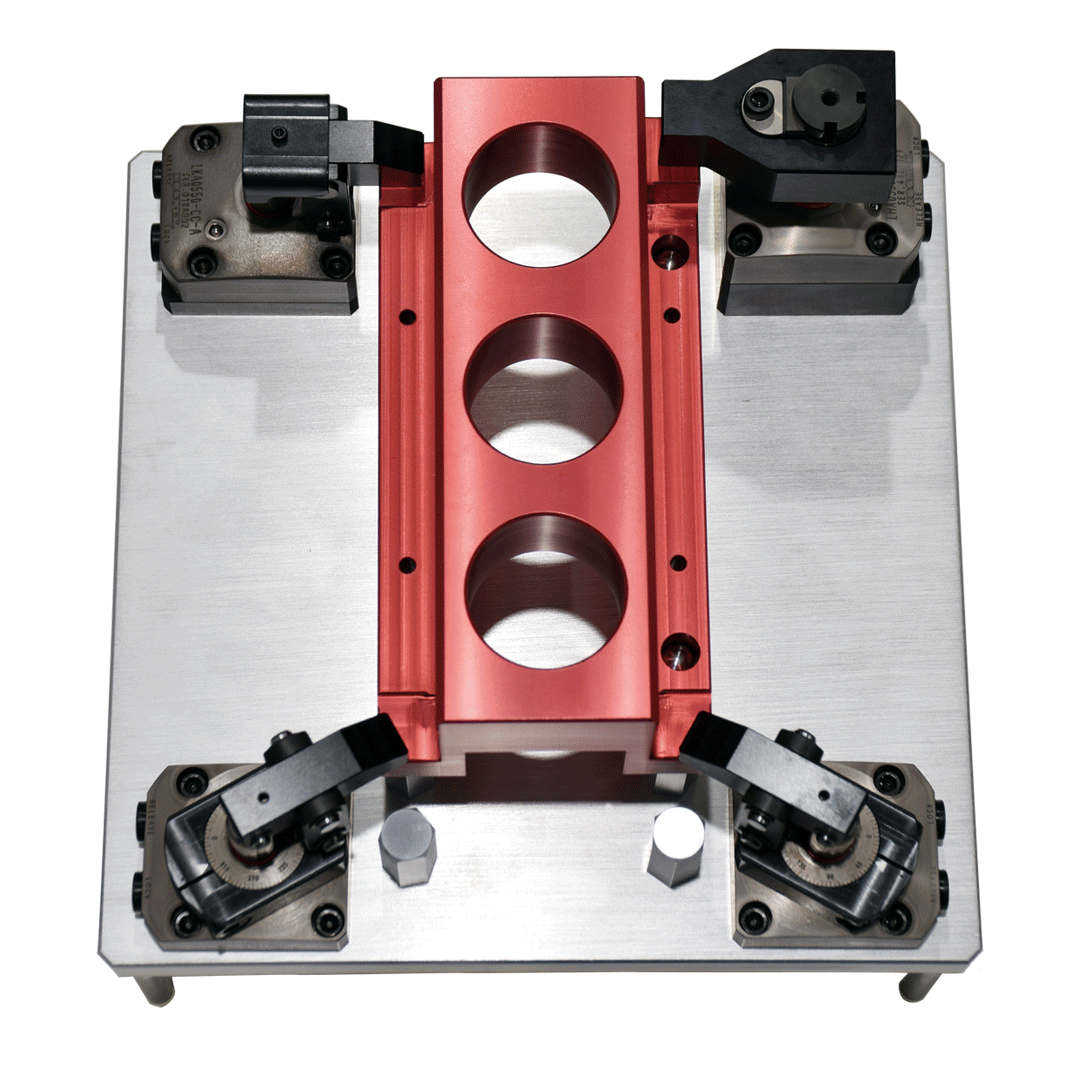 KOSMEK low-pressure clamping system improving safety and reducing setup risks.