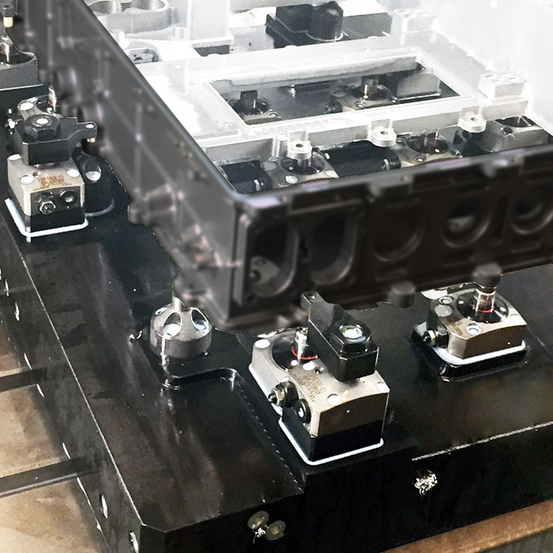 KOSMEK high-rigidity hydraulic clamping units on a fixture plate, engineered for precision positioning, repeatability, and long product life in machining and automation systems.