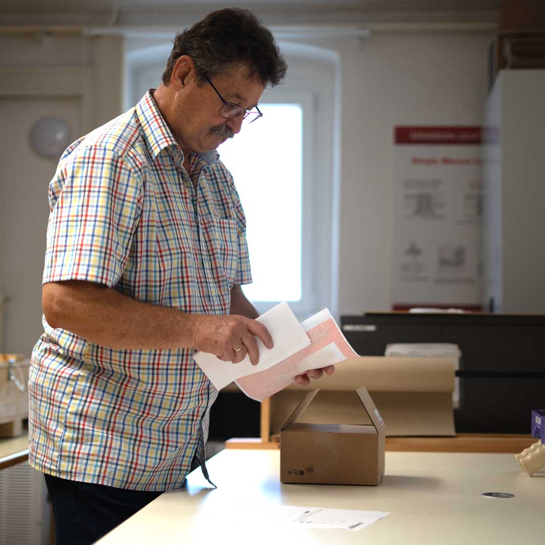 KOSMEK technician preparing components for shipment at the warehouse.