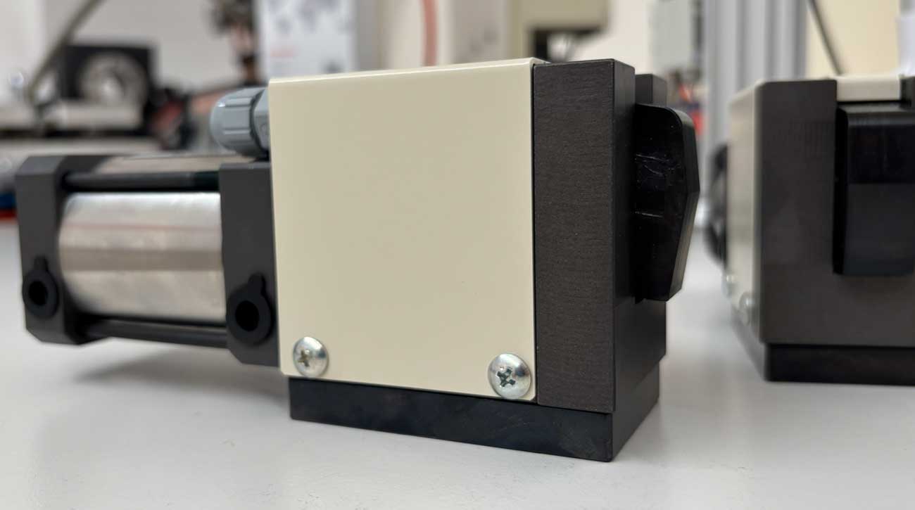 Close up of a KOSMEK HC clamp unit used for quick mould changes