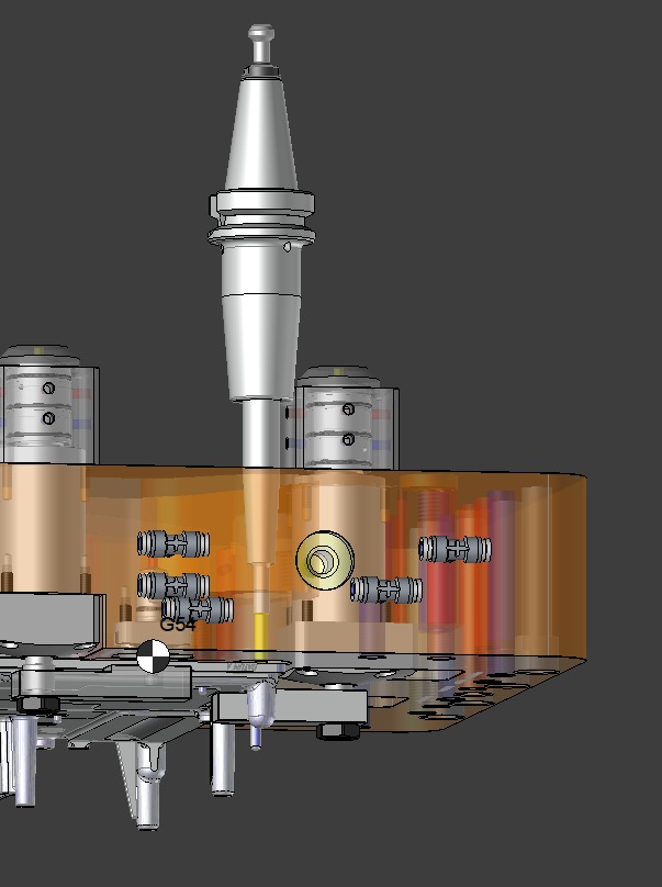 CAD view of the machining fixture showing the Pneumatic Expansion Locating Pin (VWK) locating concept for repeatable positioning in a single setup operation